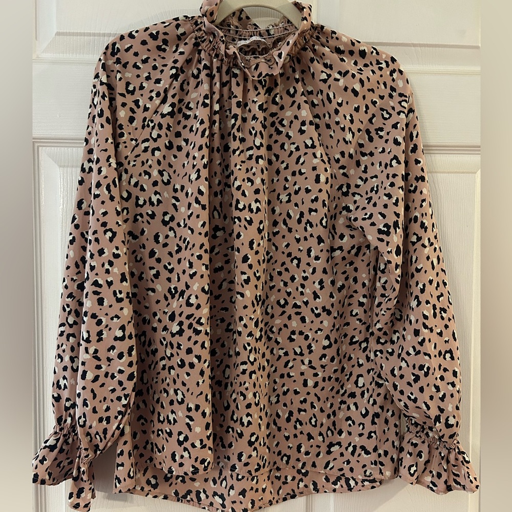 Karlie Leopard Print Blouse with ruffle neck and sleeves